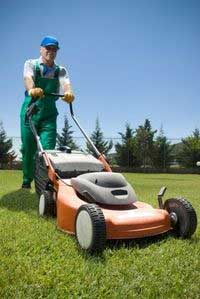 How to start a lawn care business. Lawn mowing business owner cutting grass.